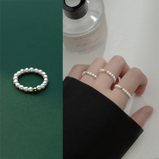Delicate Gold-Tone Ring with Light Bead Accent – Minimalist Fashion Jewelry