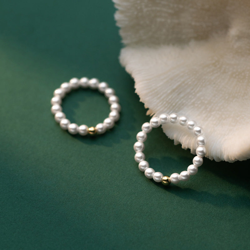 Delicate Gold-Tone Ring with Light Bead Accent – Minimalist Fashion Jewelry